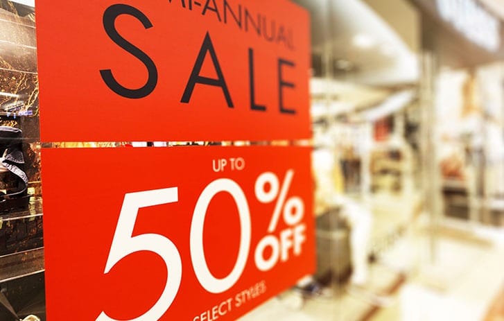 red-sale-sign-hanging-retail-store.jpg